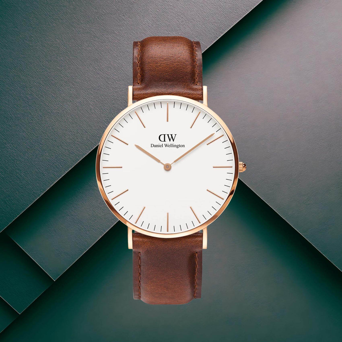 Ανδρικό ρολόι Daniel Wellington Classic St Mawes DW00100006 με καφέ δερμάτινο λουράκι, λευκό στρογγυλό καντράν διαμέτρου 40mm και λεπτομέρειες σε ροζ χρυσό χρώμα.