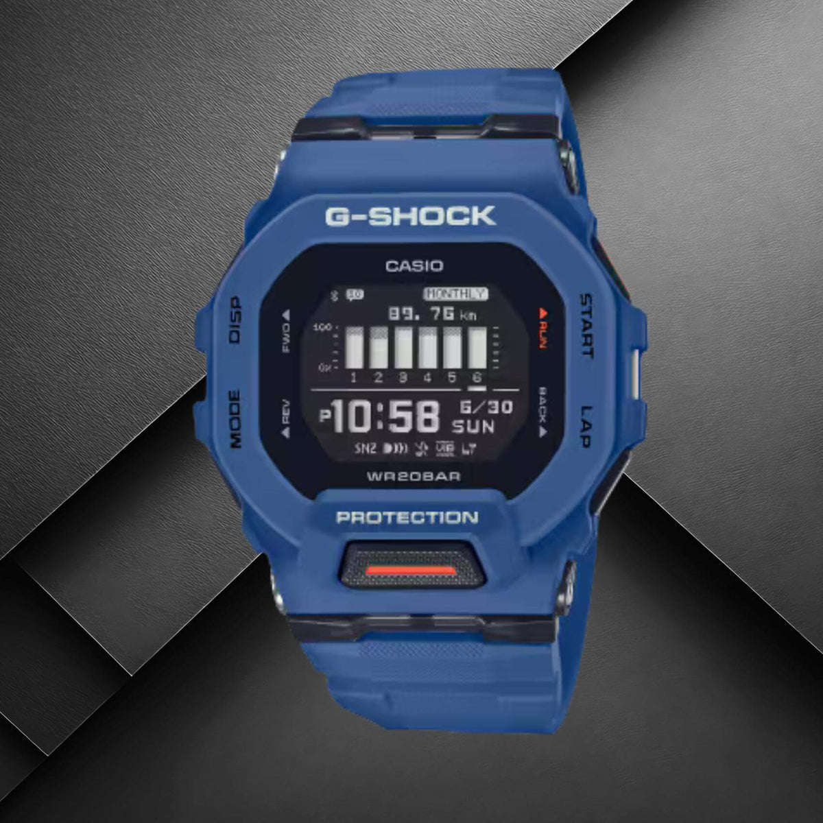 Ανδρικό ρολόι Casio G-Shock GBD-200-2ER με μπλε καουτσούκ λουράκι και μαύρο καντράν σε background.