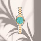 Ρολόι Michael Kors Lexington MK7579 Με Ασημί-Χρυσό Μπρασελέ & Τιρκουάζ Καντράν