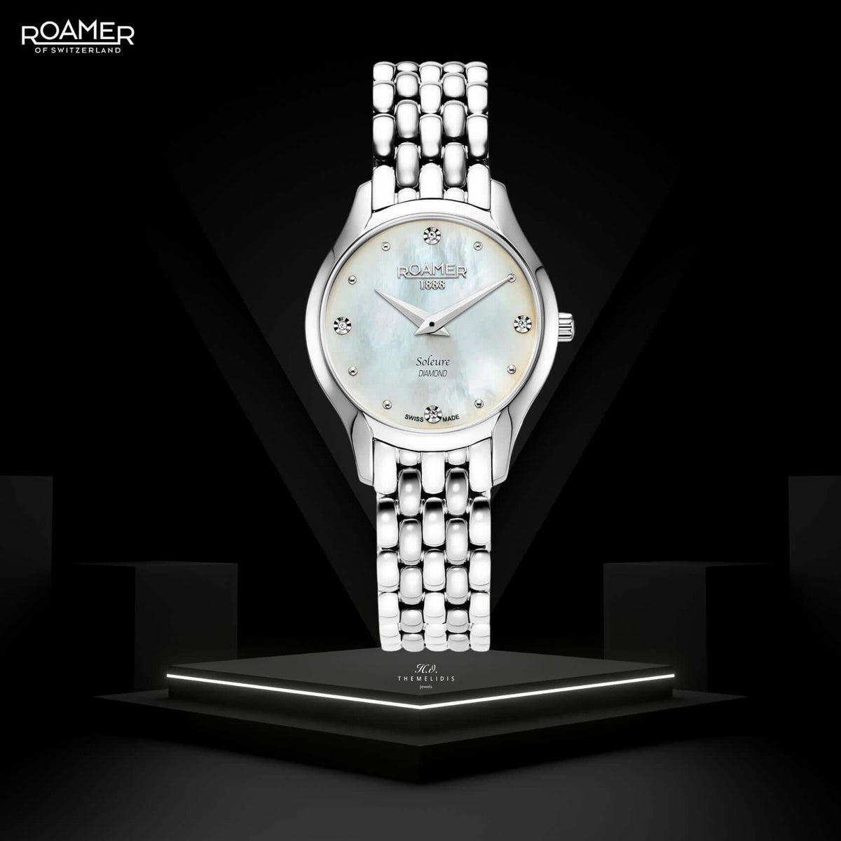 Γυναικείο ρολόι Roamer Soleure Diamond 547857-41-25-50 με ασημί ατσάλινο μπρασελέ και άσπρο φίλντισι καντράν διαμέτρου 30mm με διαμάντια.