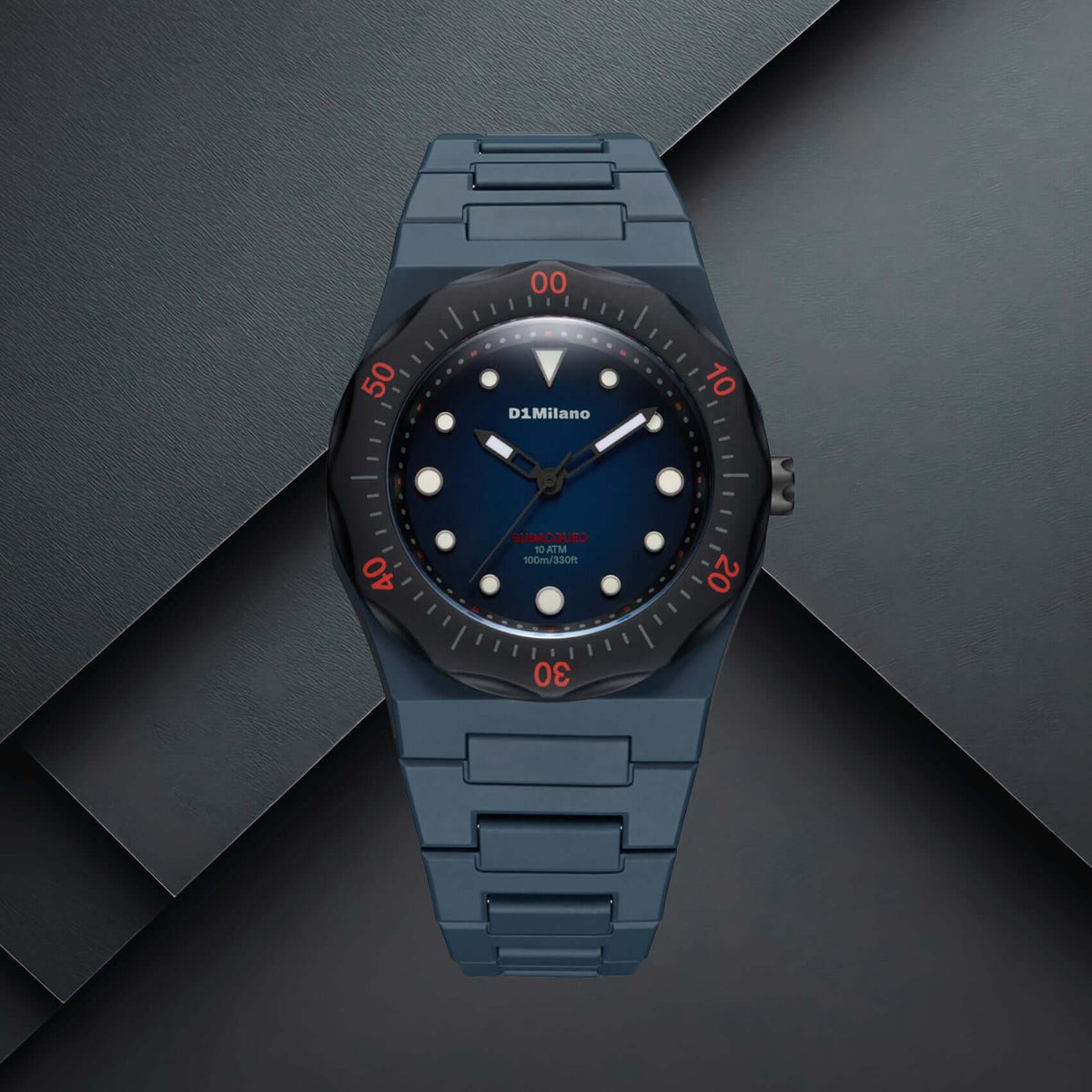 Unisex ρολόι D1 Milano Carbon Diver D1-PDBJ02 σε studio background με μπλε πολυκαρμπονικό μπρασελέ και μπλε καντράν.